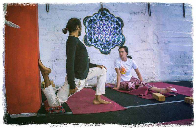 legstretch-hari-wall | Yoga Teacher Training in India at Shree Hari School | Certified YTT course Asana yoga teacher shows streching with wall