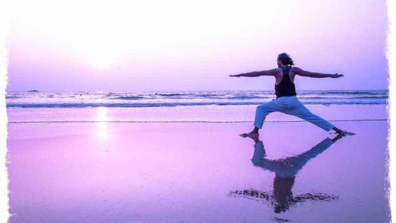 sunset at the beach with yoga teacher