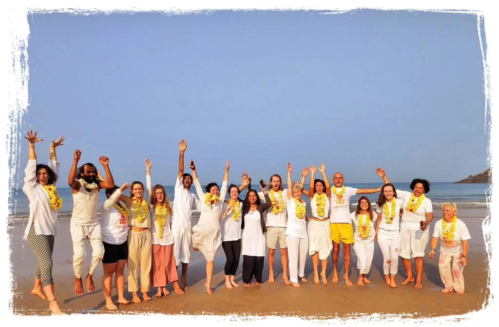 yoga group at the beach