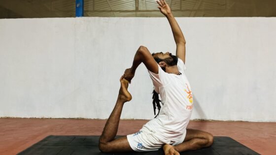 Ek pada rajkapotasana International Toga day